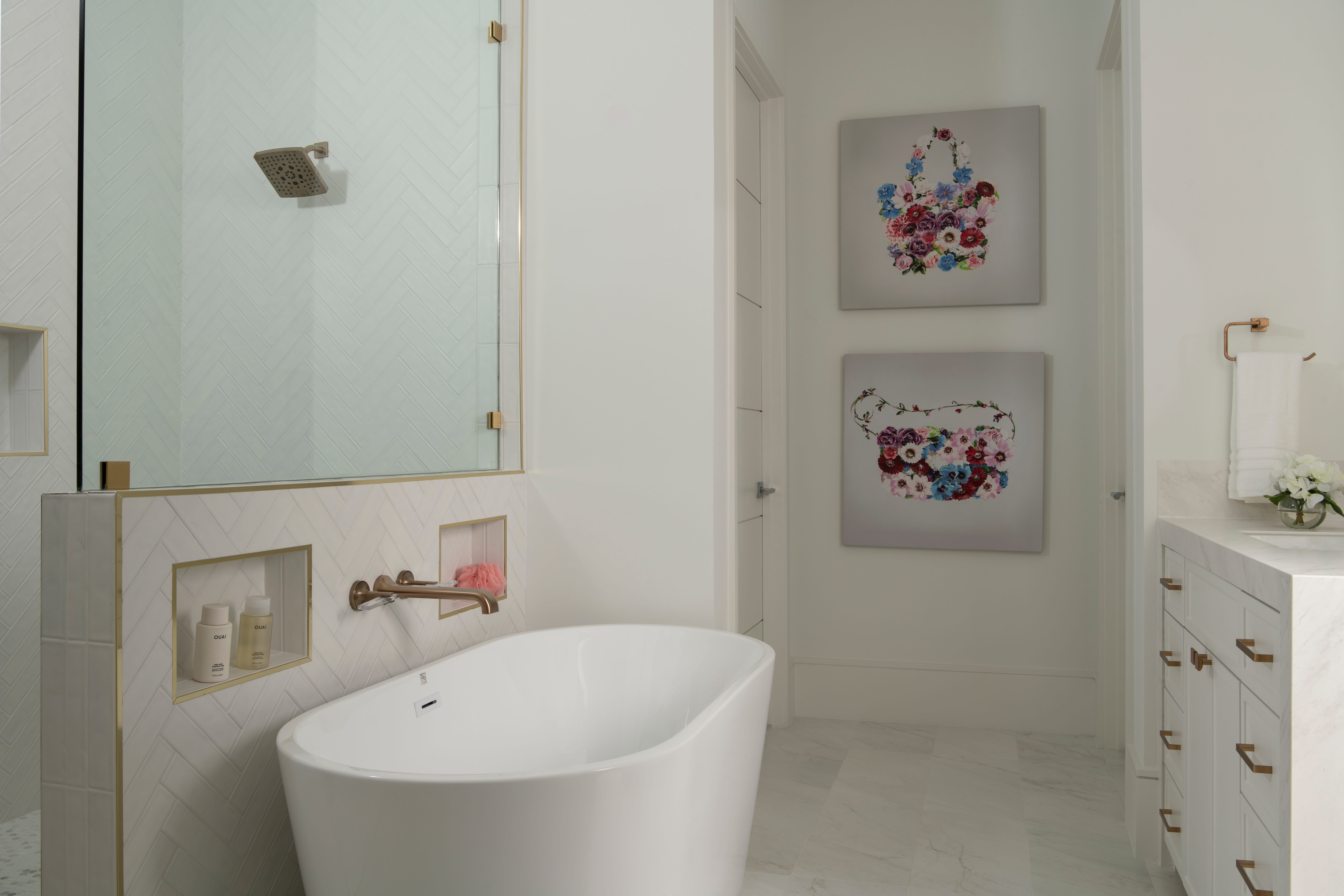 Kid-friendly custom bathroom with walk-in shower, soaking tub, durable tile, and built-in storage