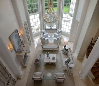 french manor living room with high ceilings