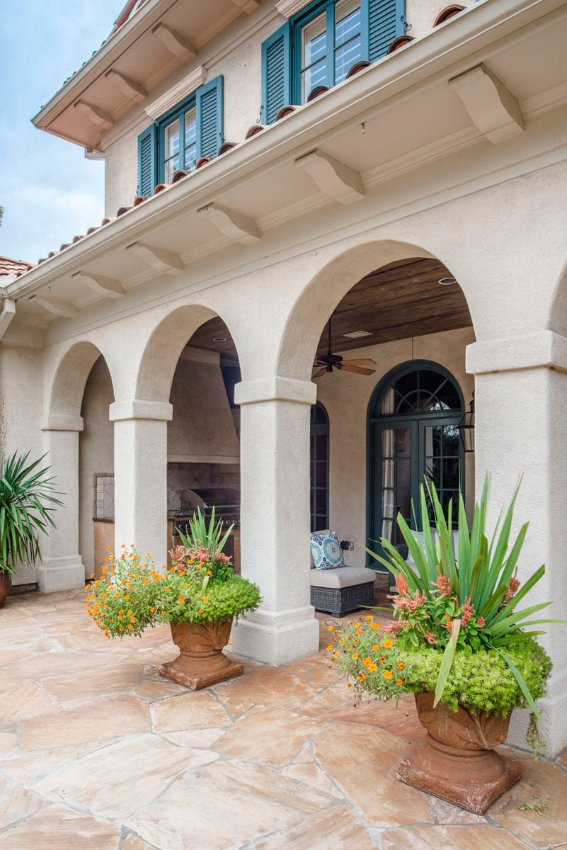 italianate mediterranean back patio archway design