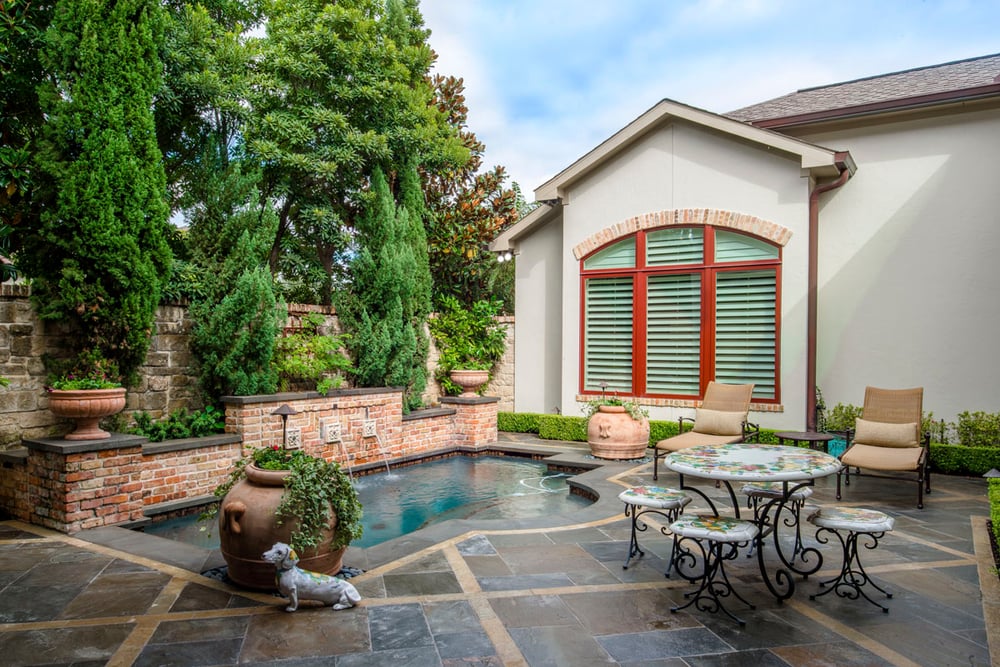 backyard patio and pool of custom home