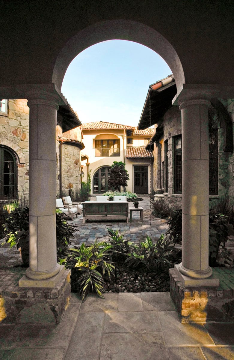 custom tuscan villa backyard archway