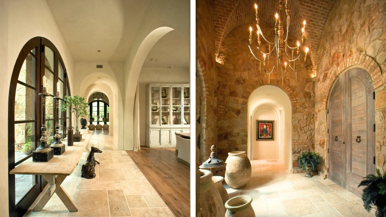 Custom home hallways featuring arched openings, stone walls, wood flooring, and decorative lighting.
